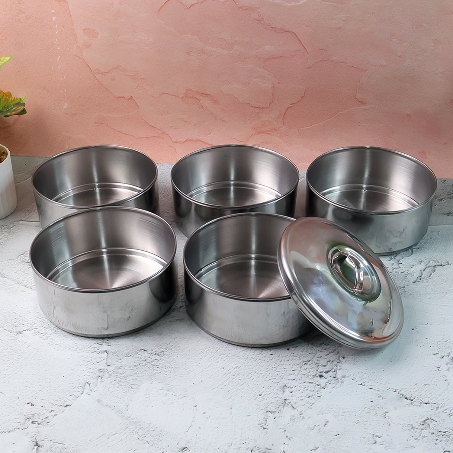 Side view of closed stainless steel lunch box