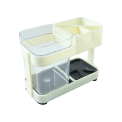 Toothpaste and brush holder organizer on countertop