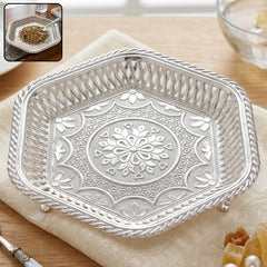 Decorative silver square serving tray with embossed floral design and lattice border