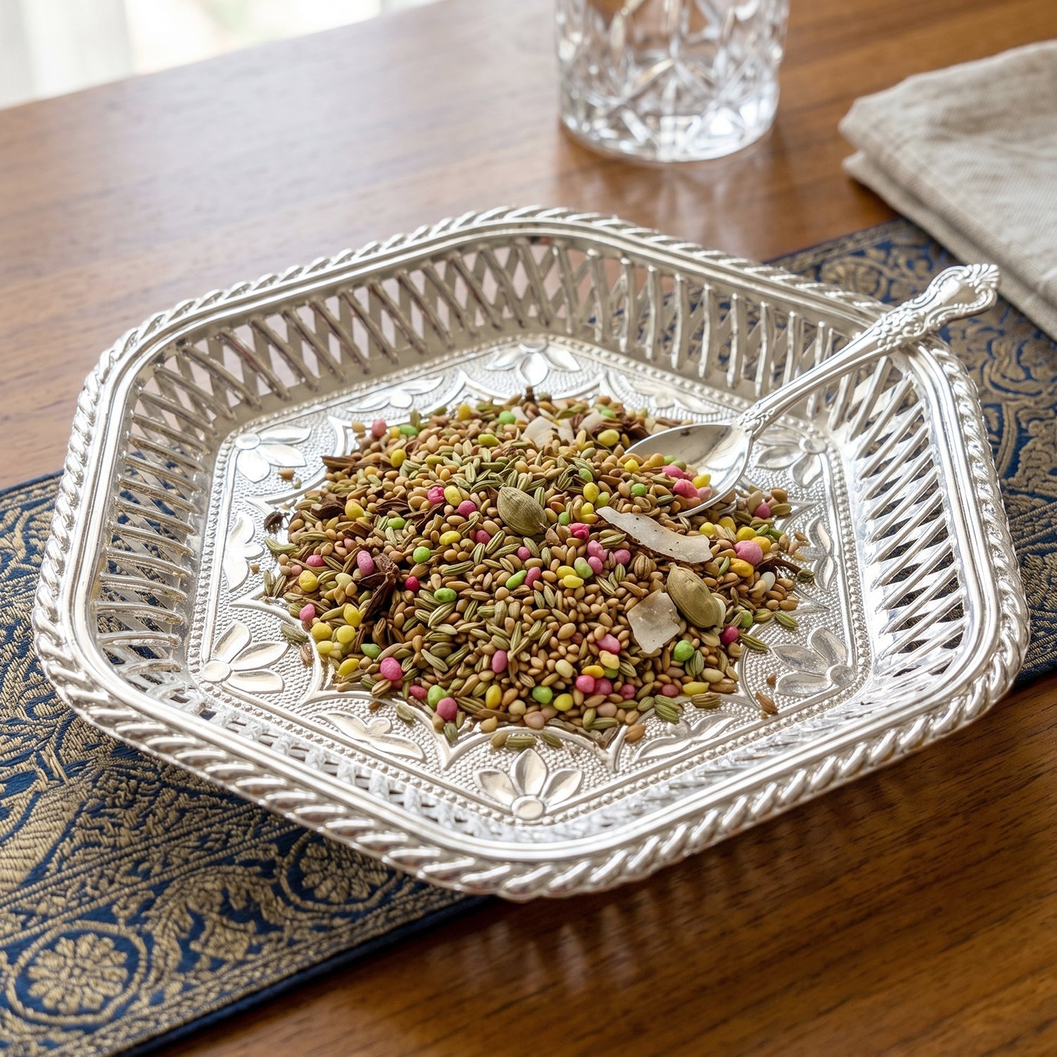 Traditional embossed floral pattern silver serving tray for festivals and special occasions