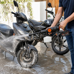 Car washer spraying a high pressure jet