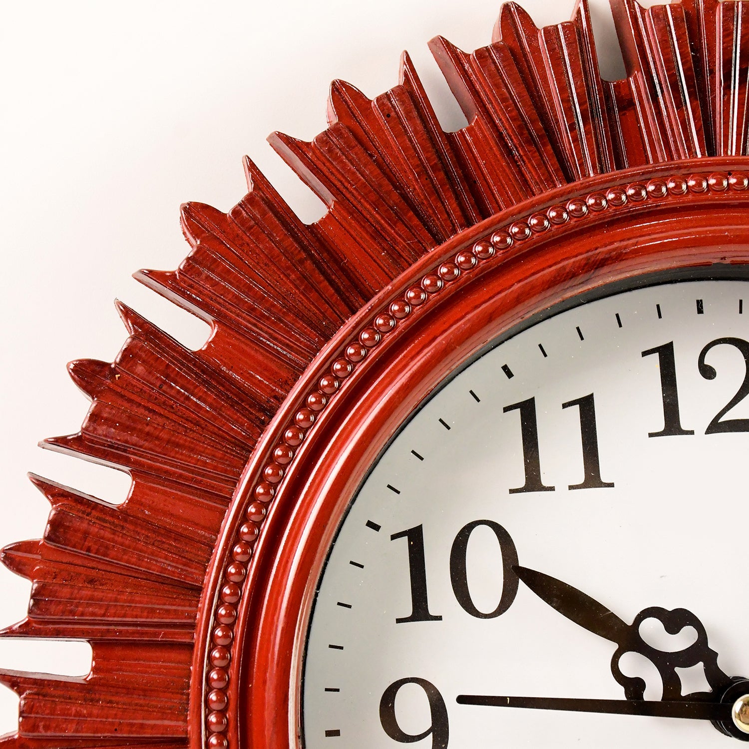 Side view of wooden look round wall clock
