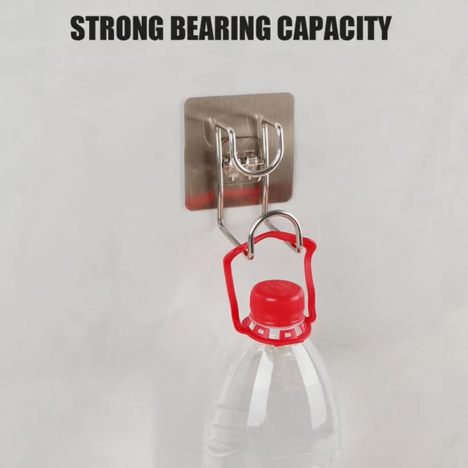Transparent adhesive hook securely holding a kitchen towel