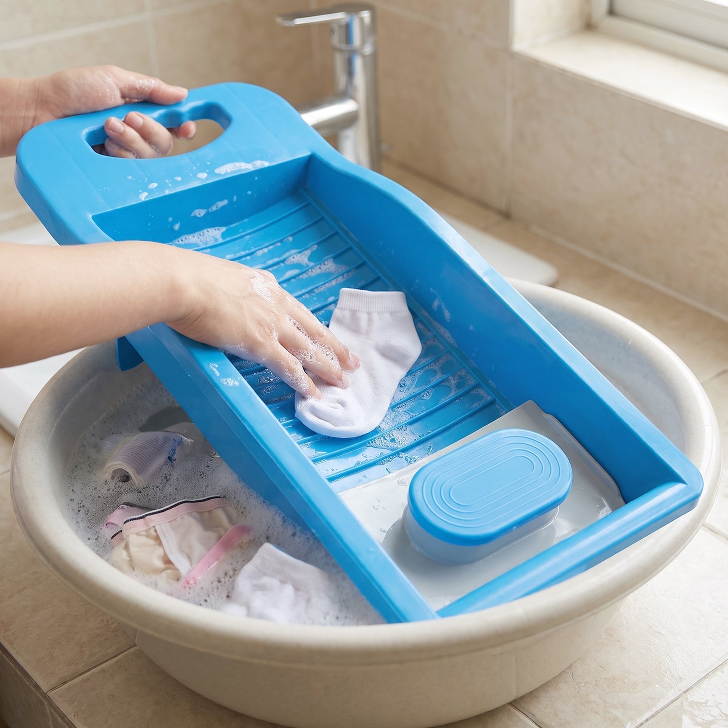 Mini washing board used to hand wash socks