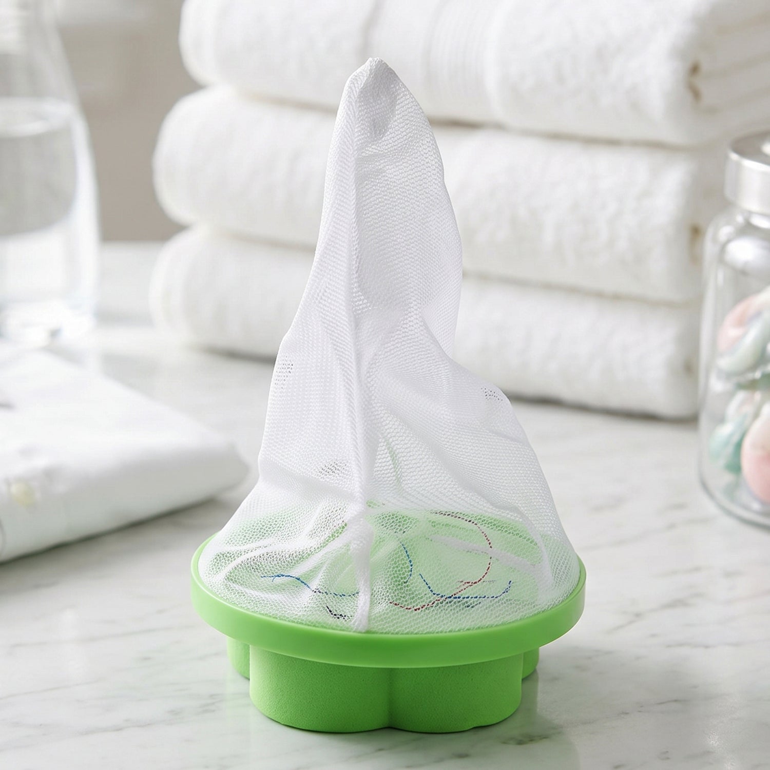 ReusAble laundry lint catcher floating inside washing machine
