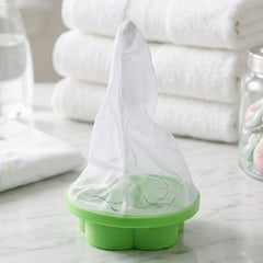 ReusAble laundry lint catcher floating inside washing machine