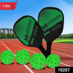 Close-up of pickleball paddles and balls for outdoor play