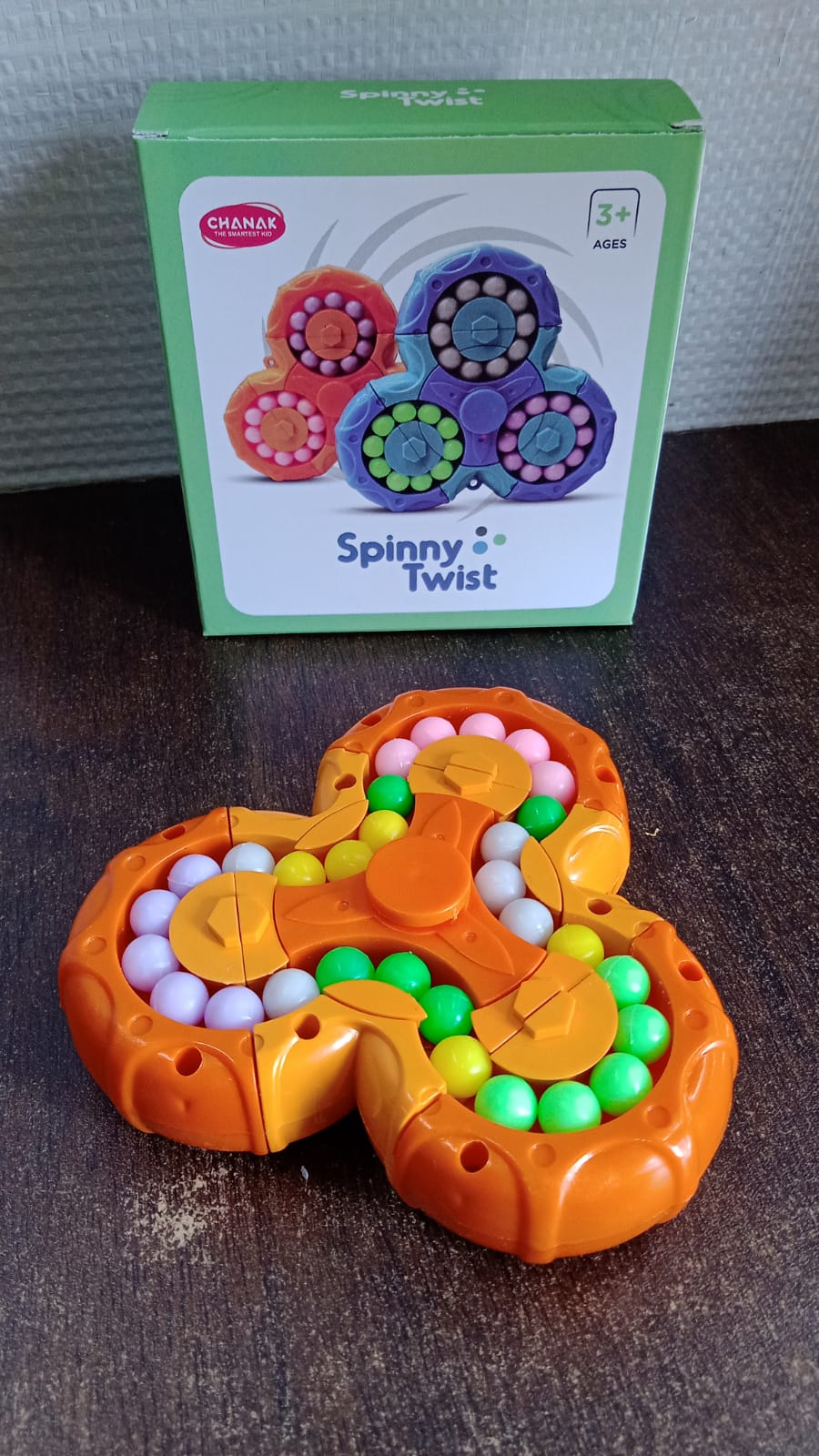 Aditi Spinny Twist Puzzle Ball packaging and toy view