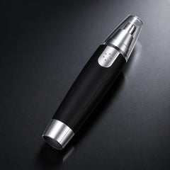 Ear and nose hair trimmer with safety cap attached