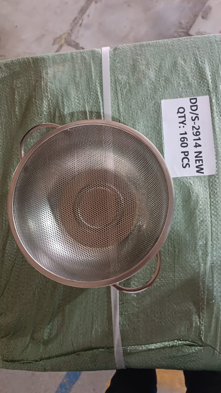 Angled view of the durable stainless steel rice & vegetable strainer