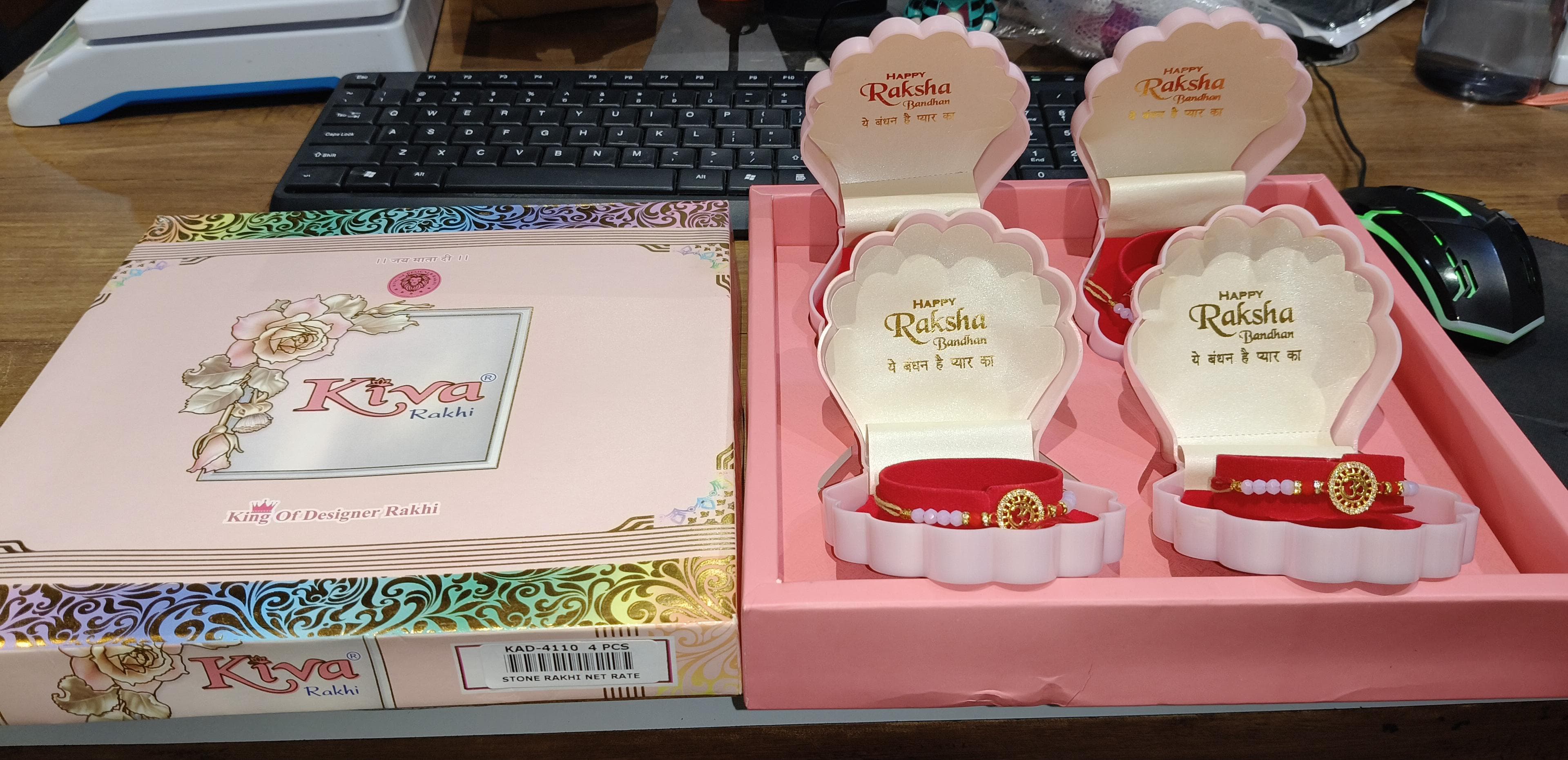 4 Pc Om Rakhi Set with Gold-Plated Dial, Pink & Red Beads â€“ Premium Designer Gift Box for Raksha Bandhan