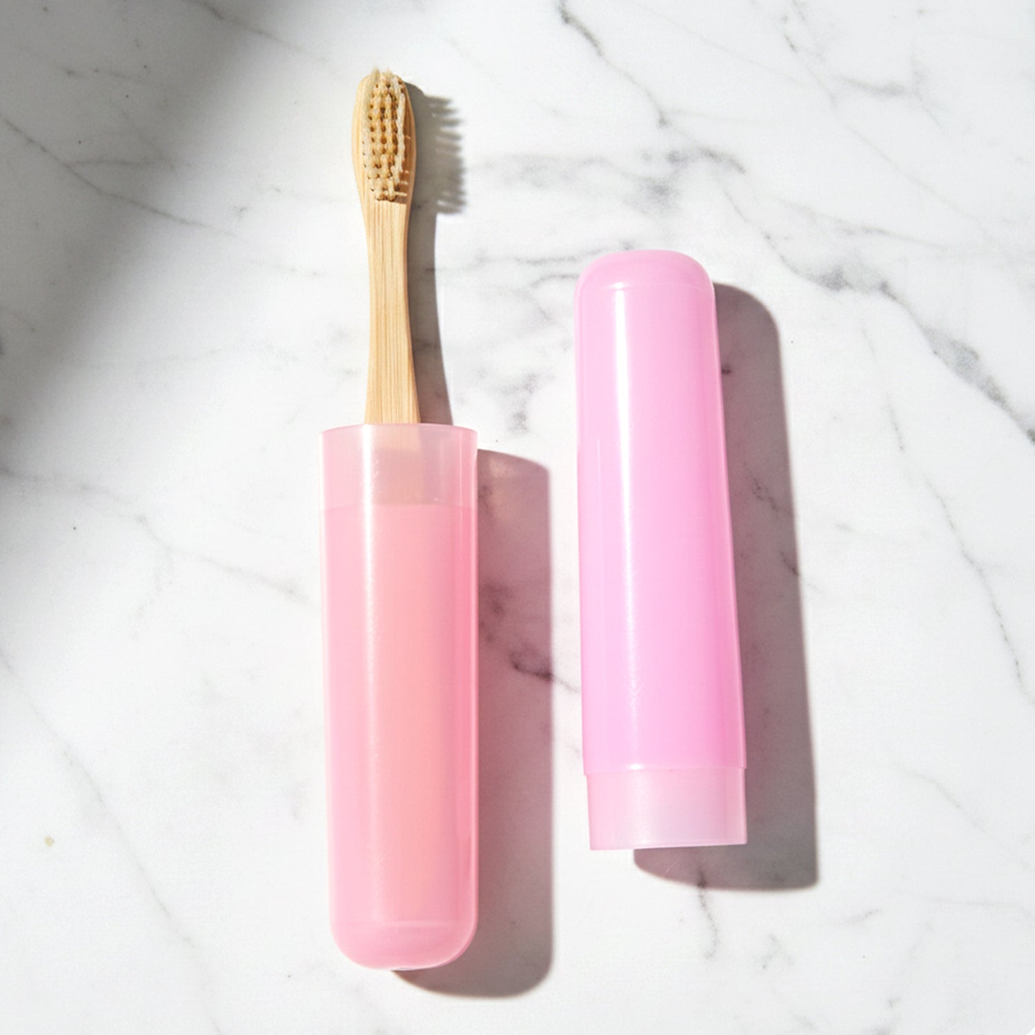 Protective toothbrush cover included with 2-in-1 toothbrush