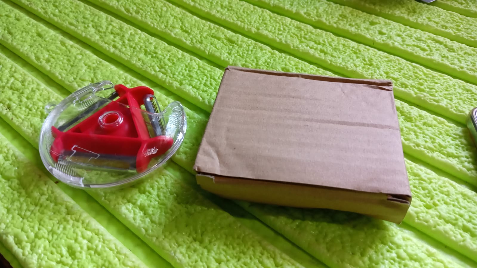 Side view of the DeoDap rotary vegetable peeler showcasing its robust design.