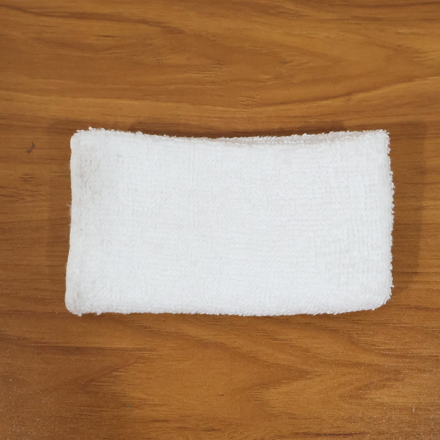 Person using microfiber cloth for cleaning furniture surface