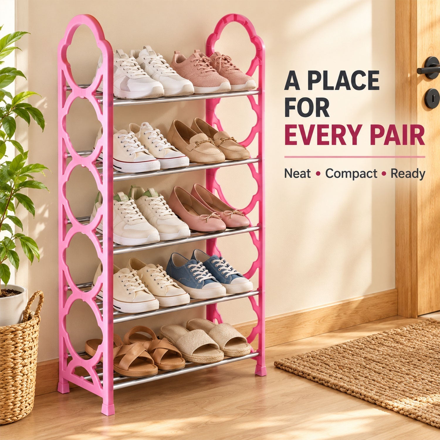 A pink five-layer shoe organizer with many pairs of shoes, positioned beside a green plant and a wooden door.