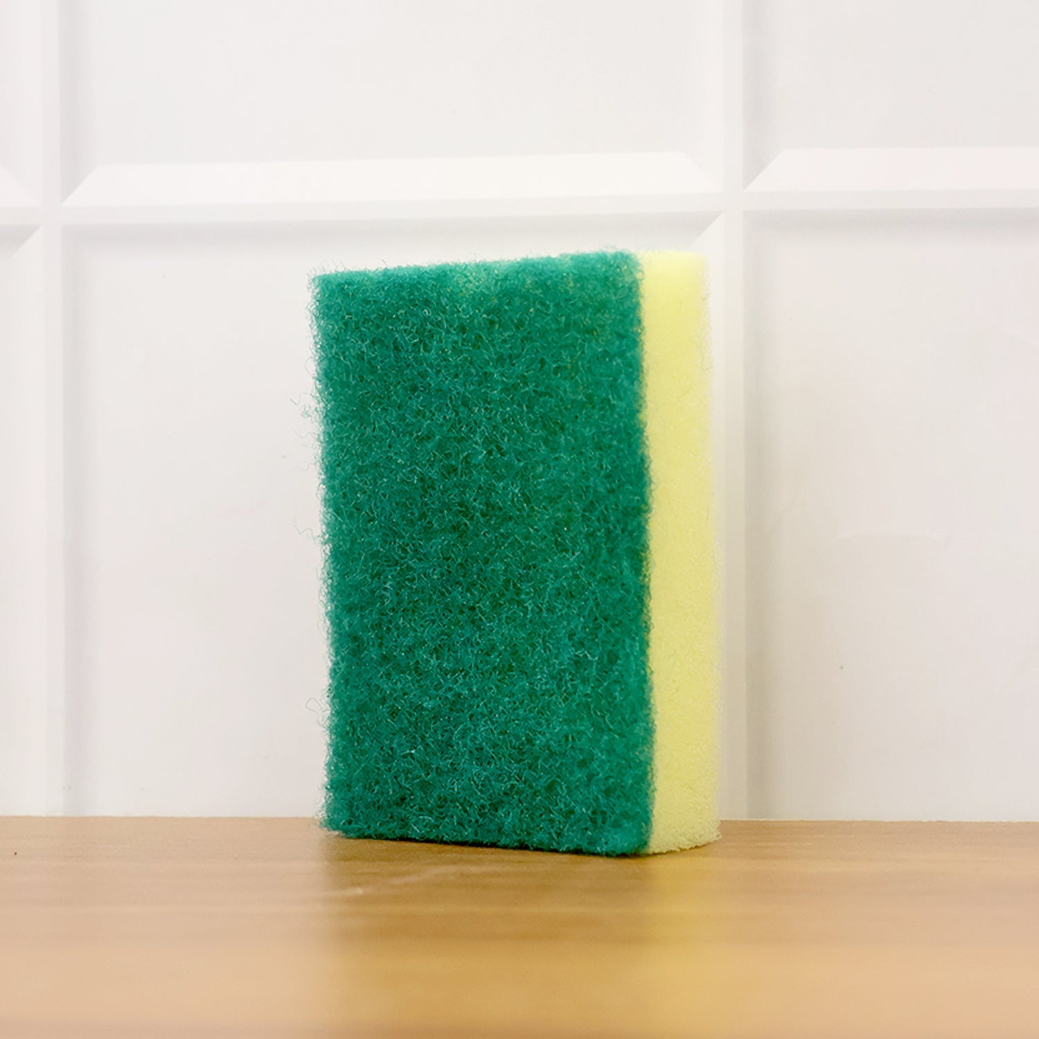 Scrub sponge cleaning household surfaces