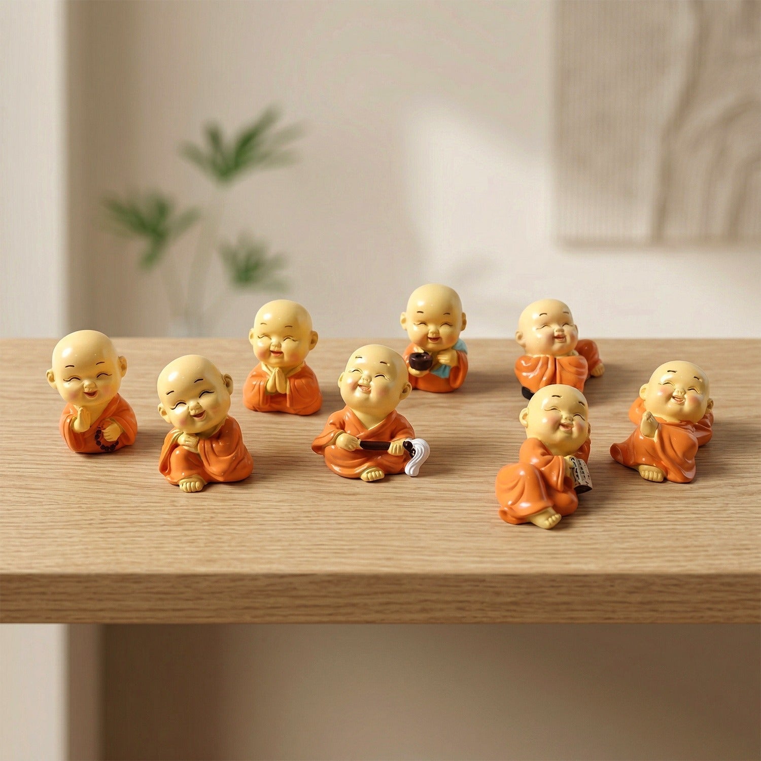 Mini Monk Buddha statue set with joyful expressions