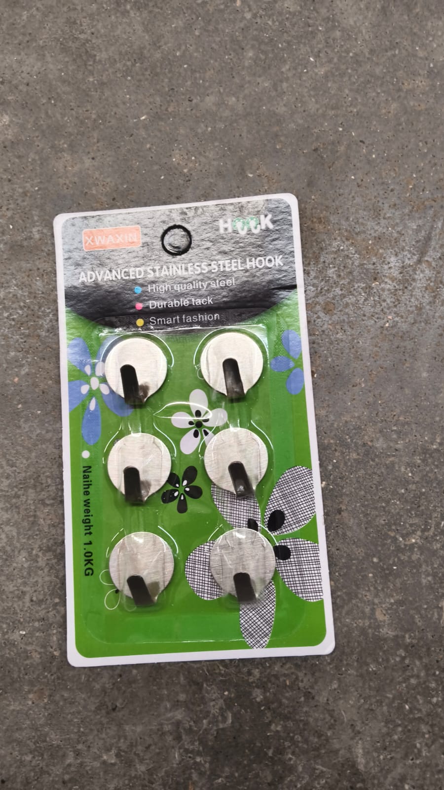 Self adhesive hooks displayed on wall