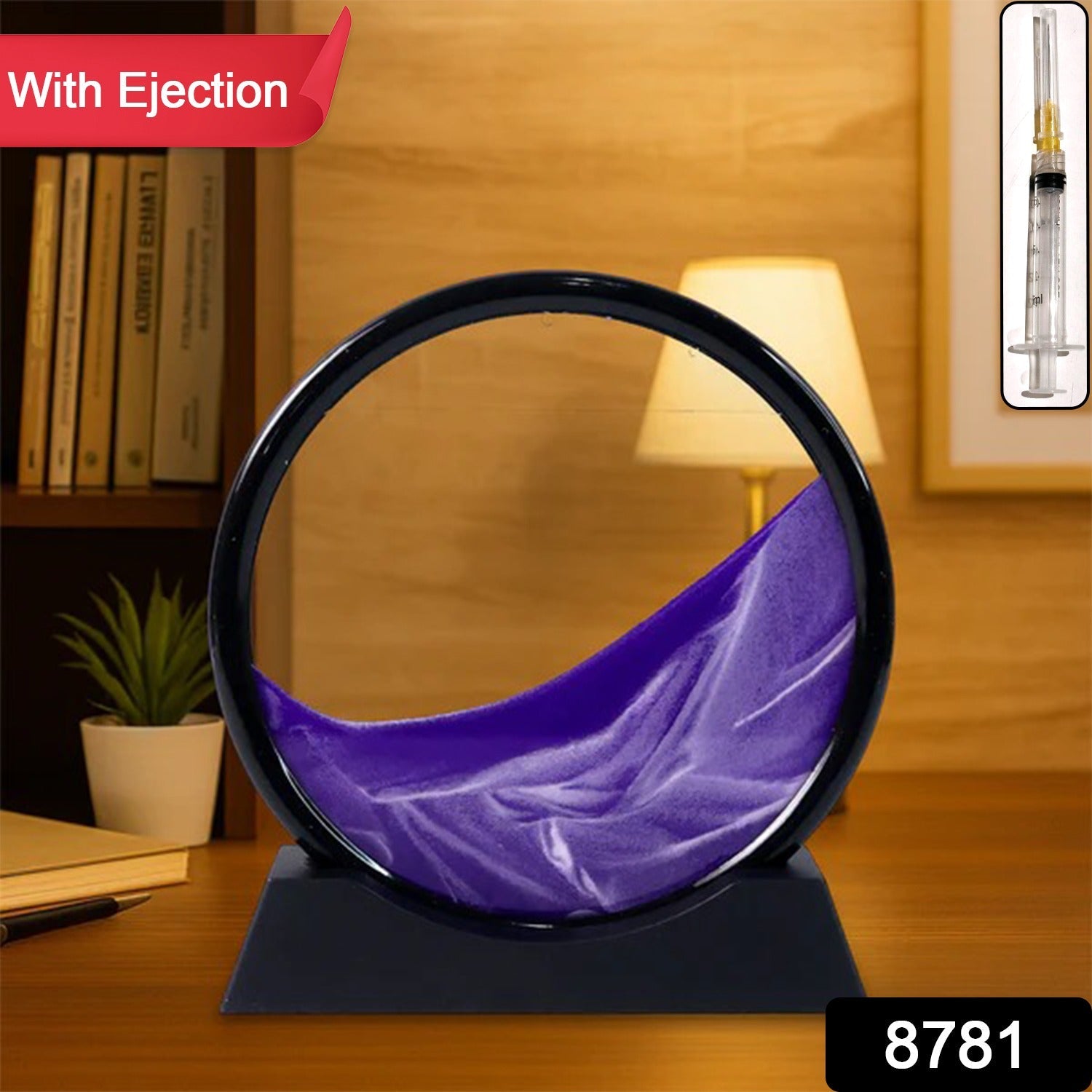 Side view of 3D moving sand art with black and golden sand in glass frame