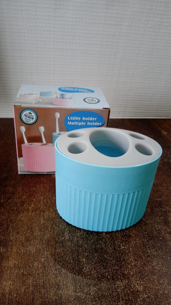 Bathroom countertop toothbrush and utility holder