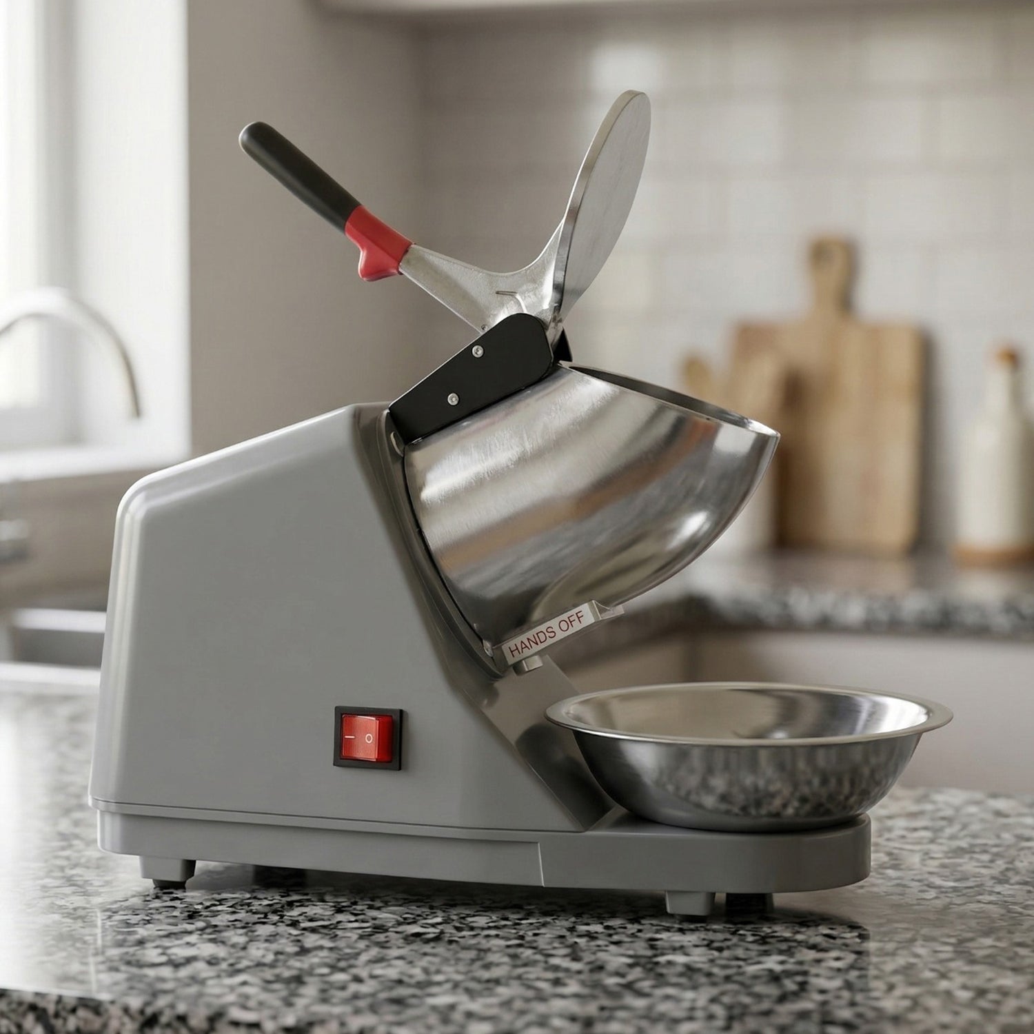 Electric ice crusher with top lid open, showing stainless steel components