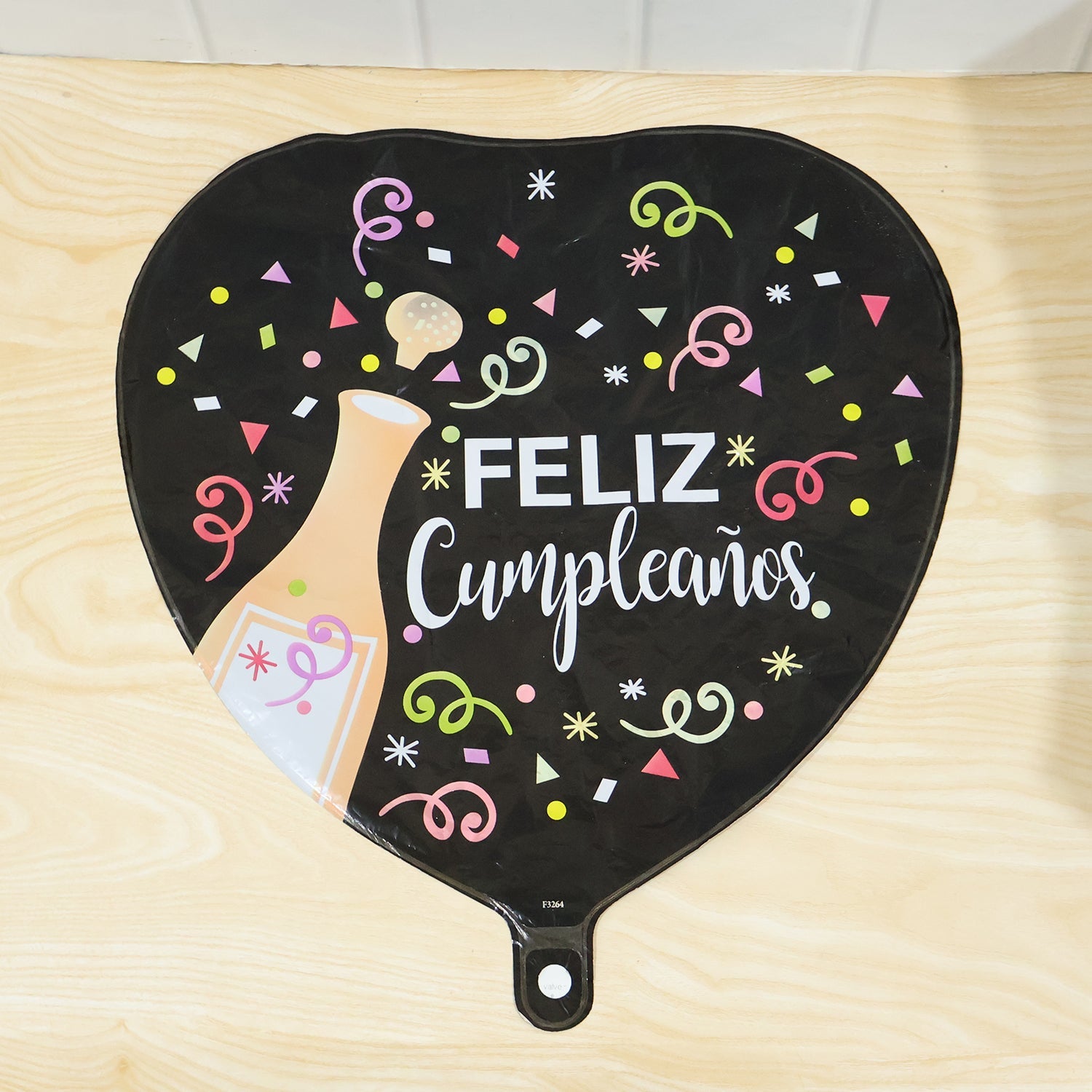 Black heart balloon celebration