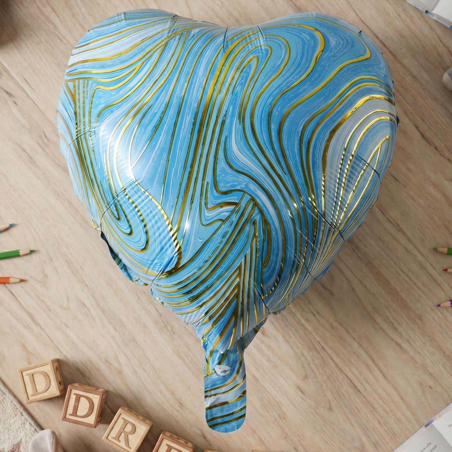 Blue heart balloon hanging