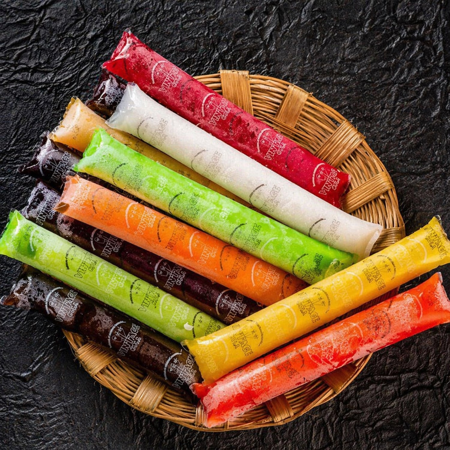 Multiple ice pop molds arranged on table