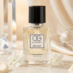 OG Luxury Enchant Eau De Parfum bottle angled with box