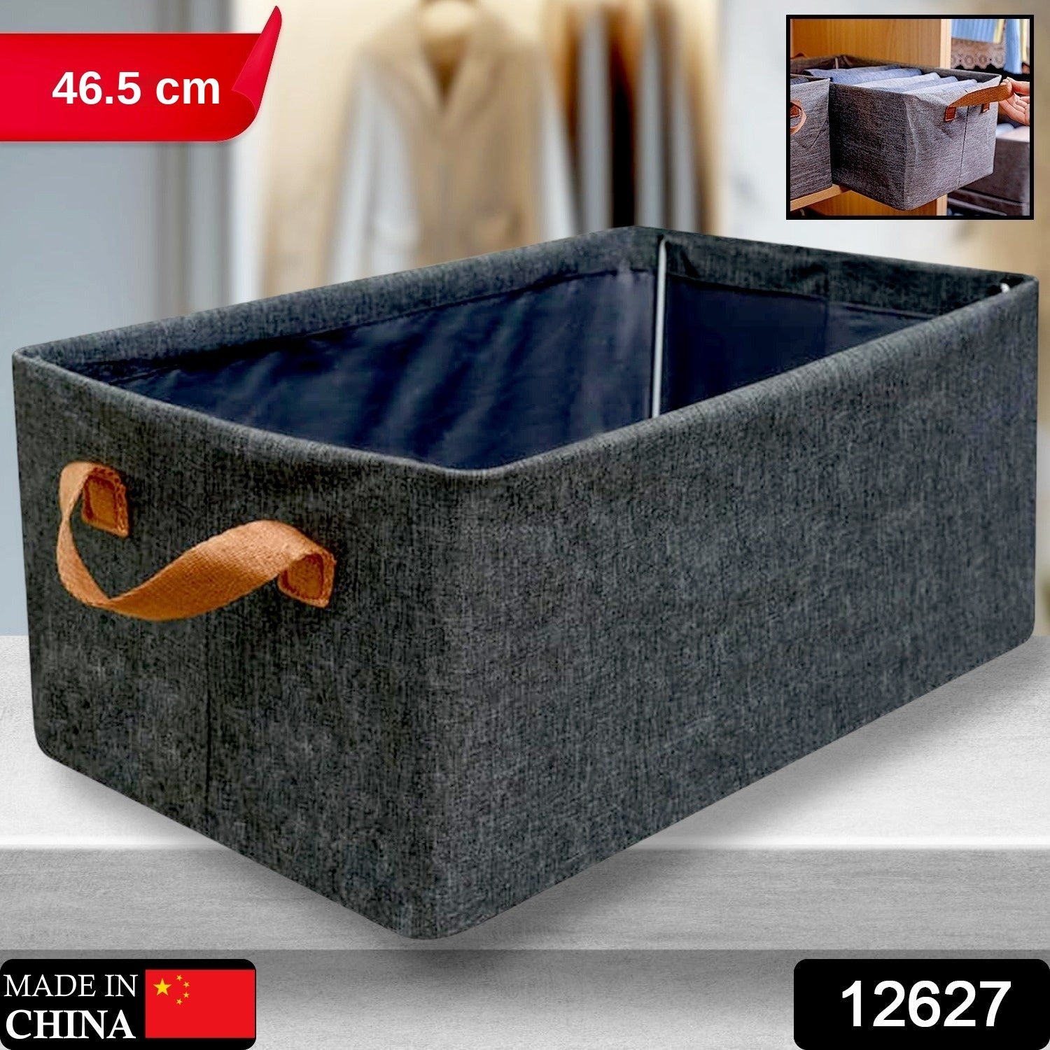A single grey fabric storage box with brown handles on a grey surface, with a small inset image.