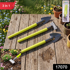 Close-up of mini gardening hand tools with steel heads and plastic handles