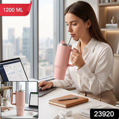 Pink stainless steel tumbler with carry handle and straw