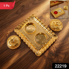 Decorative golden kumkum holder with floral lids for traditional puja