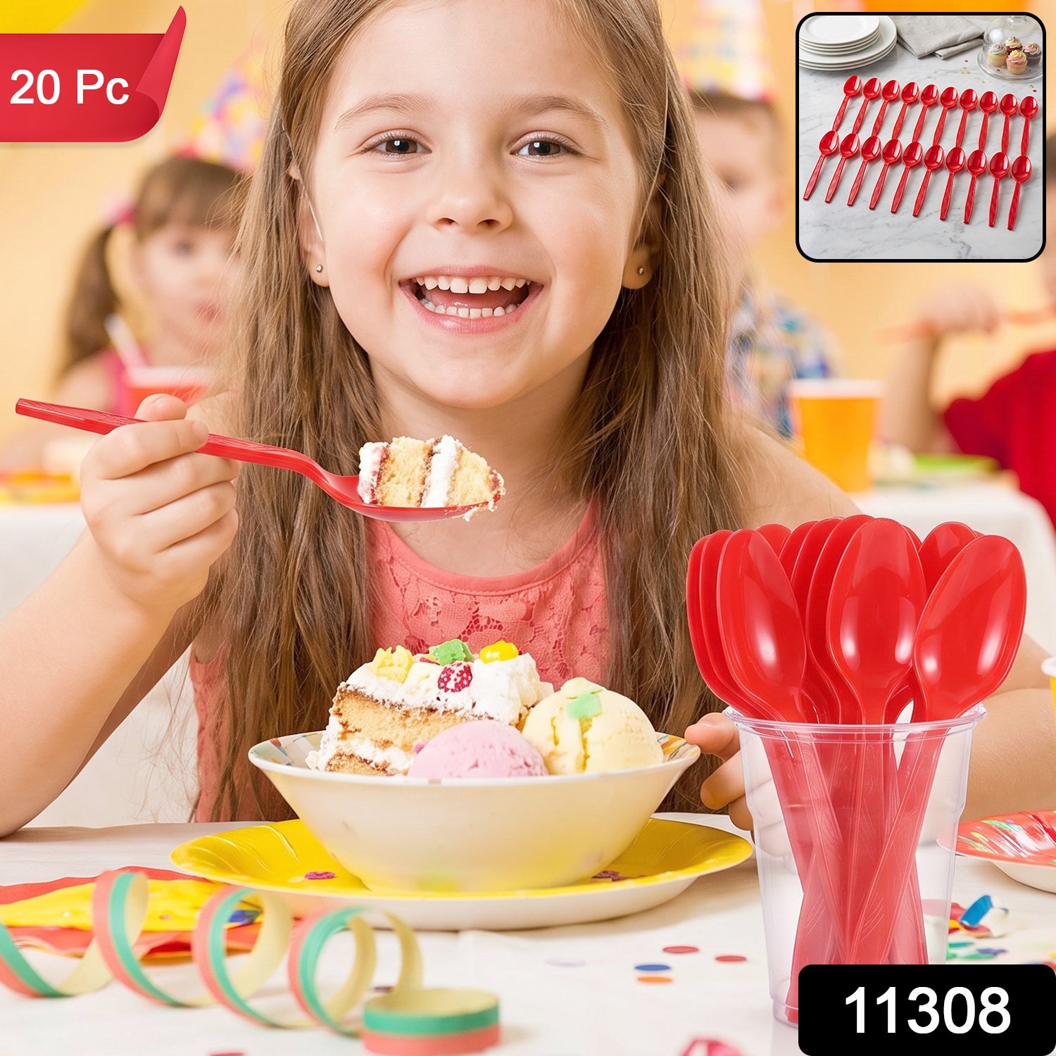 A smiling girl holds a red plastic spoon with cake, with more spoons in a cup on the right.