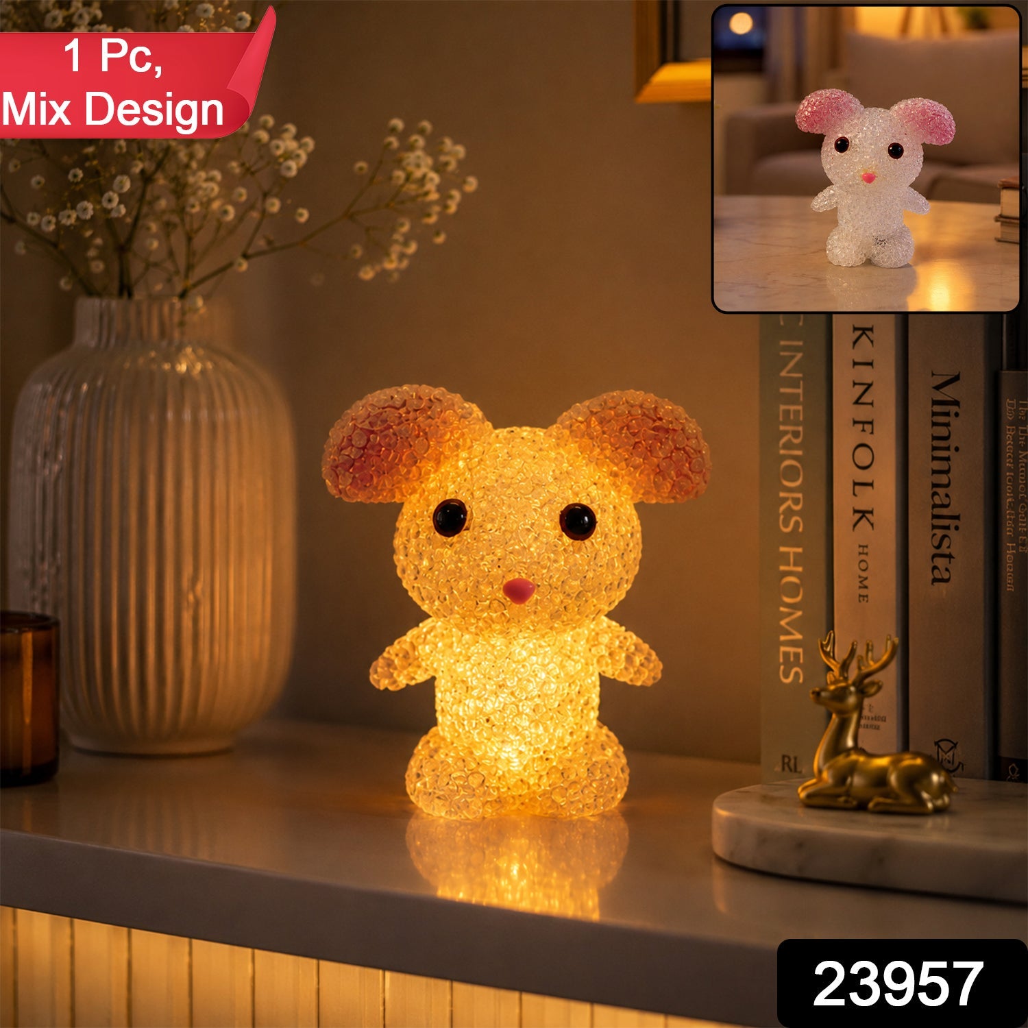 A yellow mouse-shaped crystal texture LED lamp glowing on a white shelf with a vase and books.