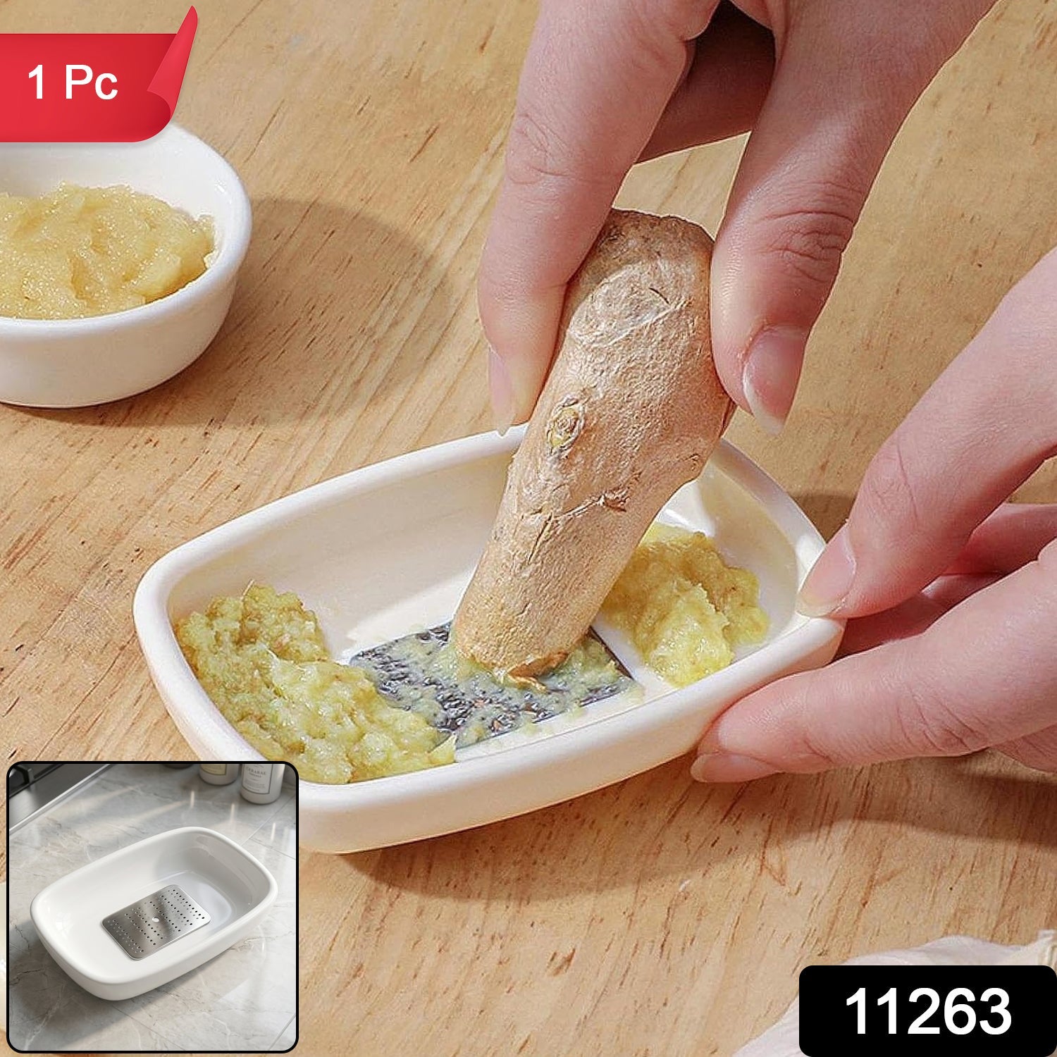 Close-up of the garlic ginger grater plate showing its compact dish shape