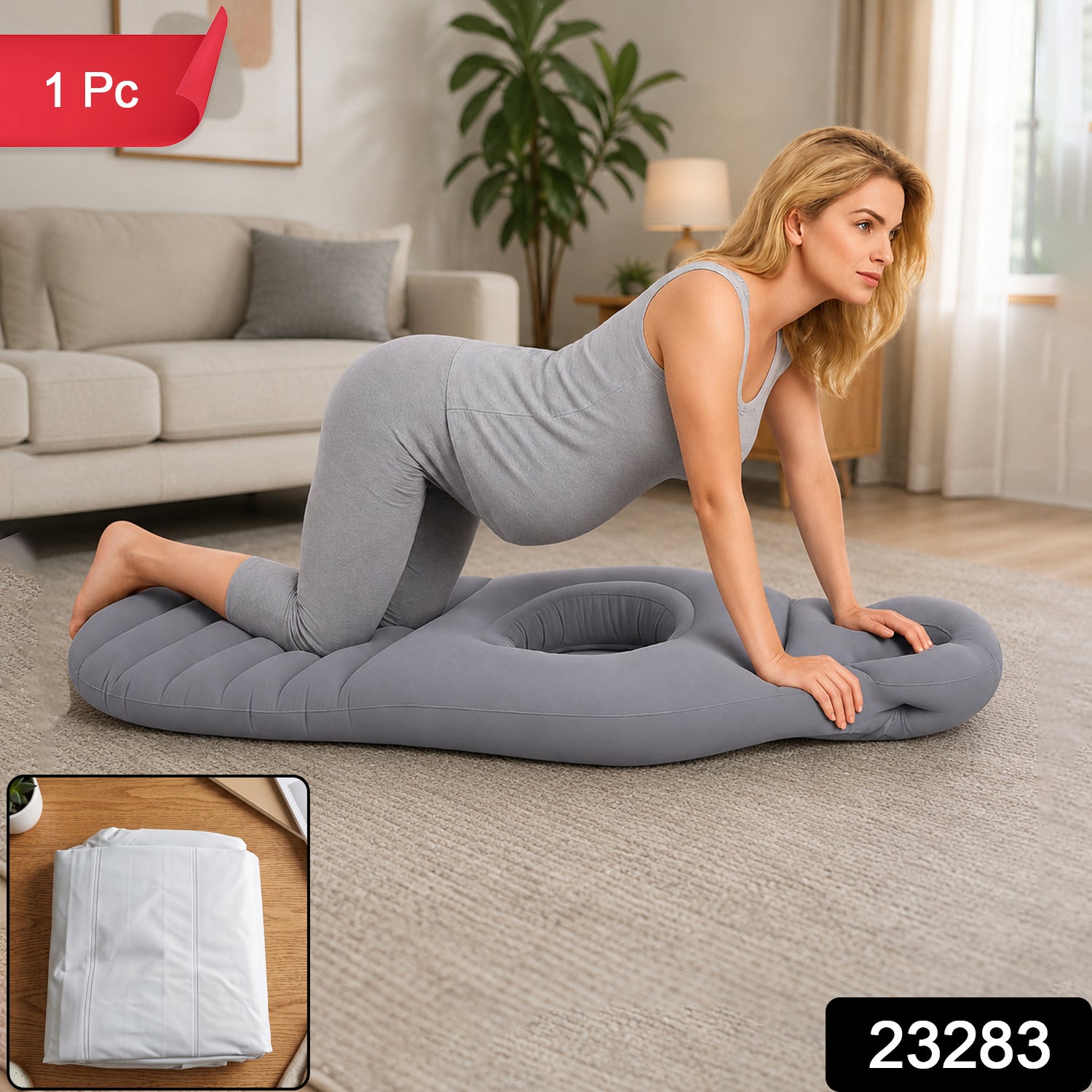 A pregnant woman in grey attire kneels on a grey inflatable mat with a belly hole in a living room, with a small inset