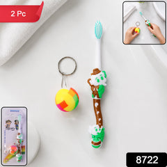 Close-up of kids toothbrush with small ball toy