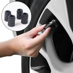 Set of 4 tire valve stem caps displayed in a line