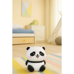 Soft glowing panda night lamp on a bedside table for kids' room